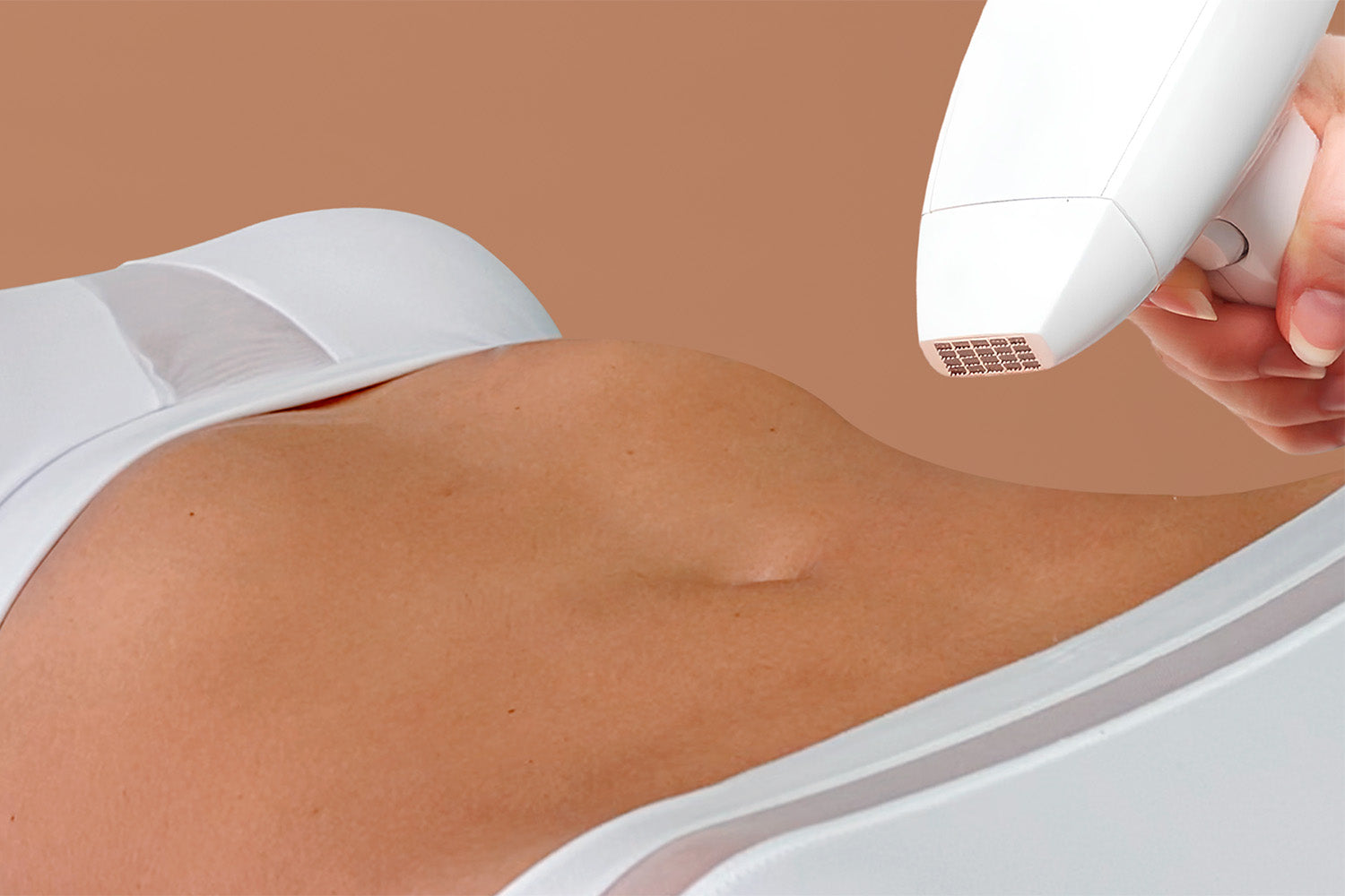 A woman receiving a cosmetic treatment on her abdomen. 